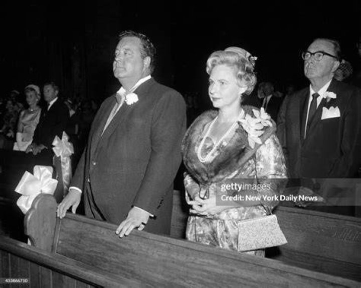Jackie Gleason and his wife, Genevieve, at the wedding of their... News