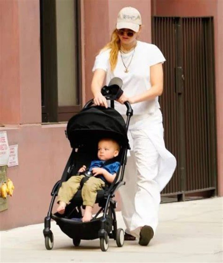 Jennifer Lawrence Takes Son Cy, 10 Mos., For Walk In LA Photos